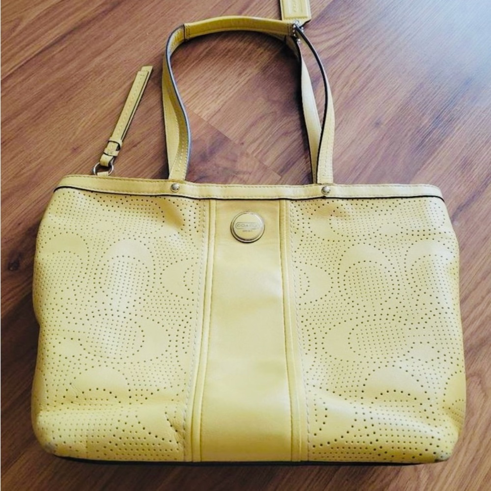 Coach Yellow Perforated Leather Handbag